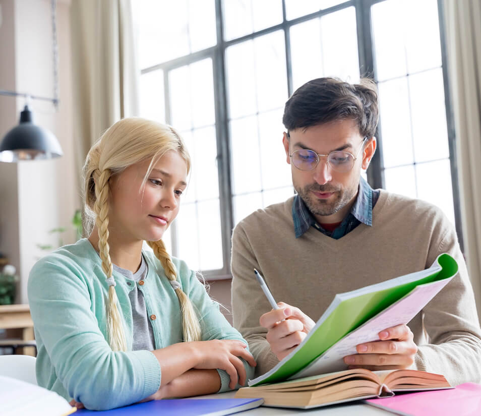 A High Performance tutor working one-on-one with a student